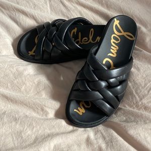 Like new black leather slip on sandals